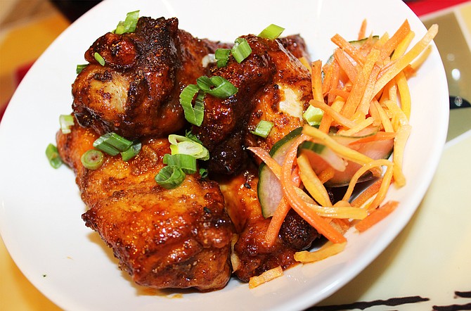 A dry spice rub lends unique flavor to spicy wings at Legacy Brewing Tap & Kitchen in Miramar