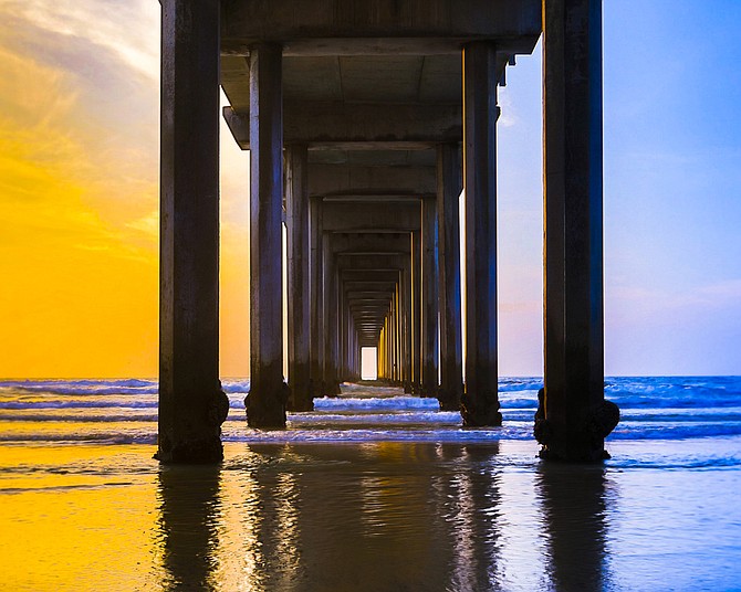 Incredibly vibrant twilight colors at Scripps Pier in La Jolla.