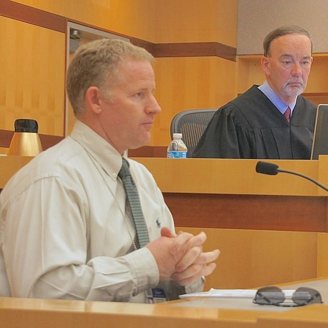 Detective Cartie and Judge Kirkman in court today. Photo by Eva