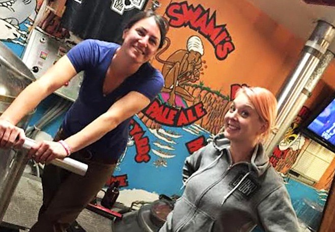 Devon Randall (left) and Melanie Pierce brewing up their contribution to the 2015 Brewbies Festival at Pizza Port Solana Beach.