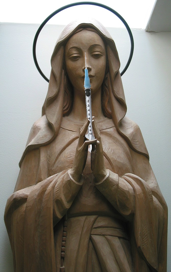 Statue of Our Lady of Inoculation at Our Lady of Peace high school.