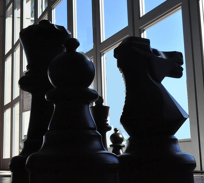 Photographed these Chess Pieces at the San Diego Central Library.
They appear to be staring out the window, longing for freedom.