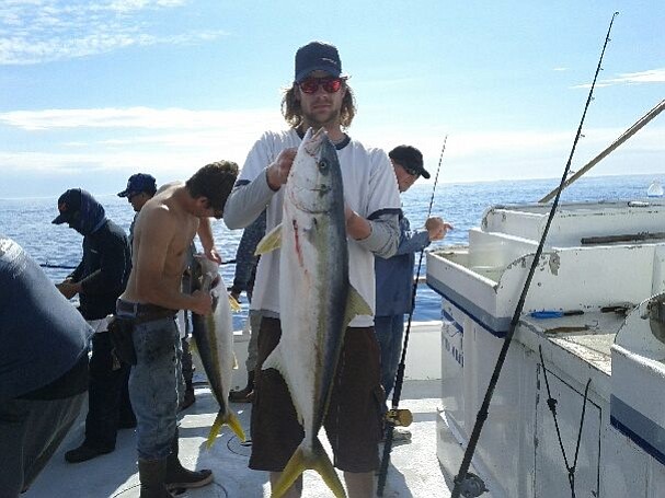 Happy angler with a nice Colonet yellowtail