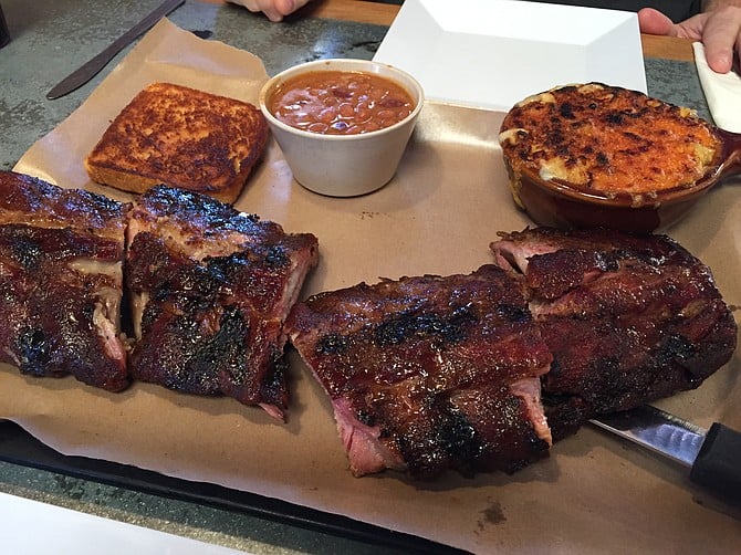Full rack of Baby Back ribs with two sides and Texas toast.