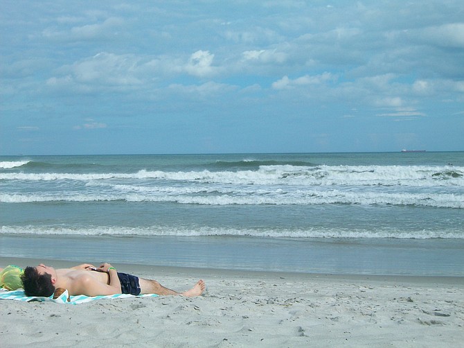 Enjoying the Atlantic Ocean breeze in Cocoa Beach Florida.