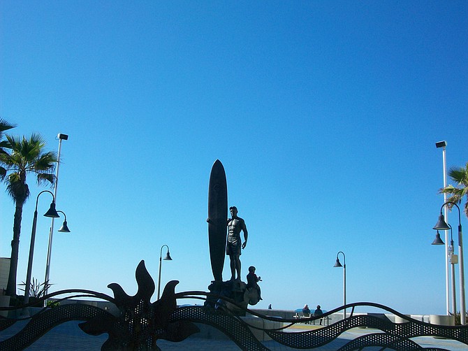 Statue of surfer at the foot of Palm Ave, in Imperial Beach.