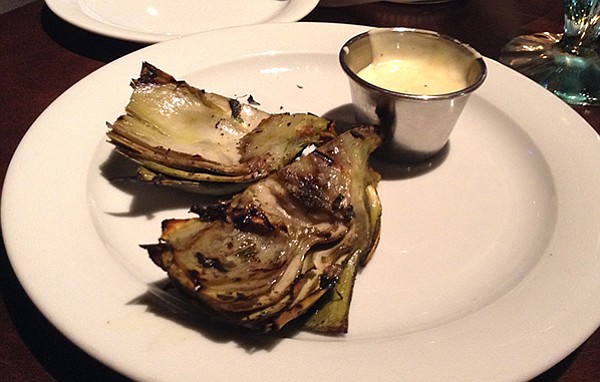The half jumbo artichoke looks underwhelming, but taste and texture conquer all doubts.