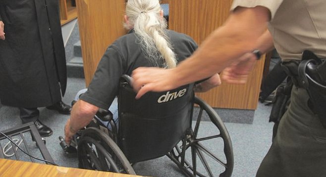 The 61-yr-old man who was struck came to court in a wheelchair. Photo by Eva