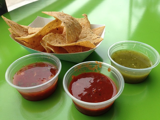 Help yourself to some chips and salsas.