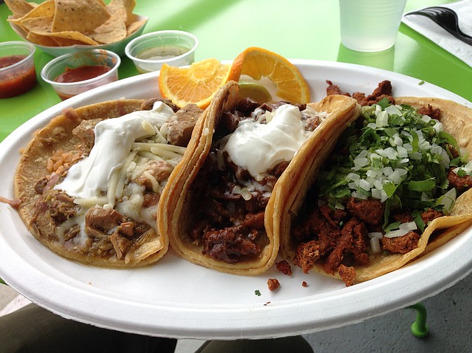 A sampling of tacos: Chile Verde, Mole Poblano and Adobada. Amorcito Corazon.
