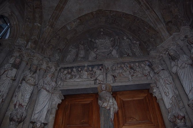 Religious statues adorn the exterior of the Cathédrale de Lausanne, consecrated in 1275.