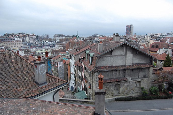 One could imagine Inspector Javert chasing Jean Valjean in "Les Mis" across the rooftops of Lausanne's French-style cityscape. 