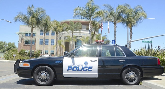 Escondido police vehicle parked in front of headquarters. Photo by Weatherston