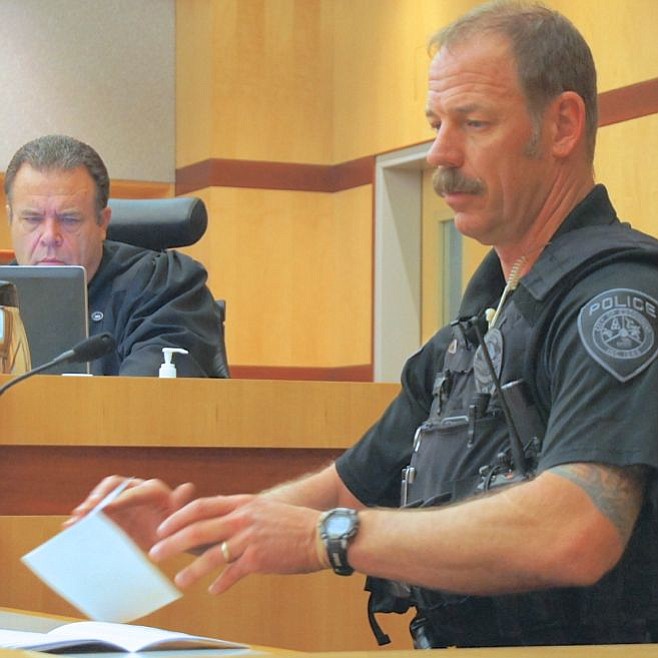Escondido police officer Grohn said he scuffled with suspect Roldan.