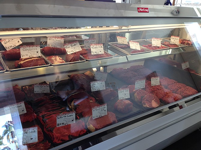 A counter filled with some of the county's most sustainably raised meats.