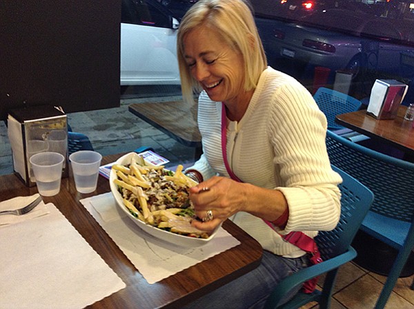 Cindy laughs at the size of her chicken shawarma salad