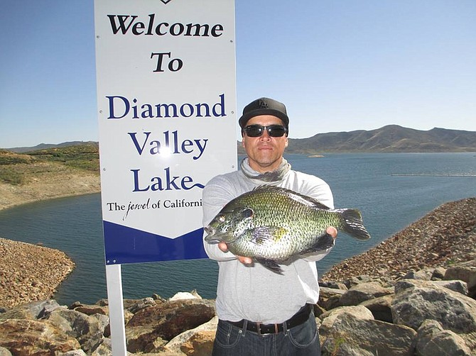 Jesse Mena with large redear sunfish from Diamond Valley Lake.