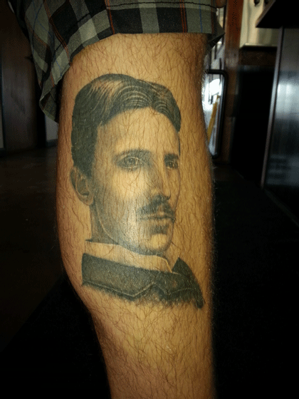 I work at Surfside Tap Room in Oceanside and one of our customers; Ryan McCarthy, has this tat of Nikola Tesla on his leg; Pretty life like! 