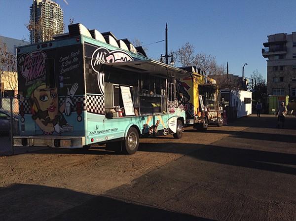 Food trucks line the eastern side of the square