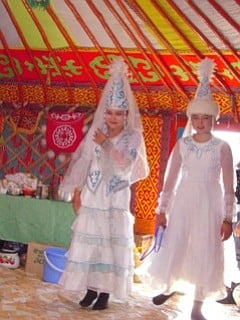 People costumed for the Kazakh festival.