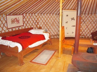 My room in the ger. The felt mat at rear is doorway to bathroom.