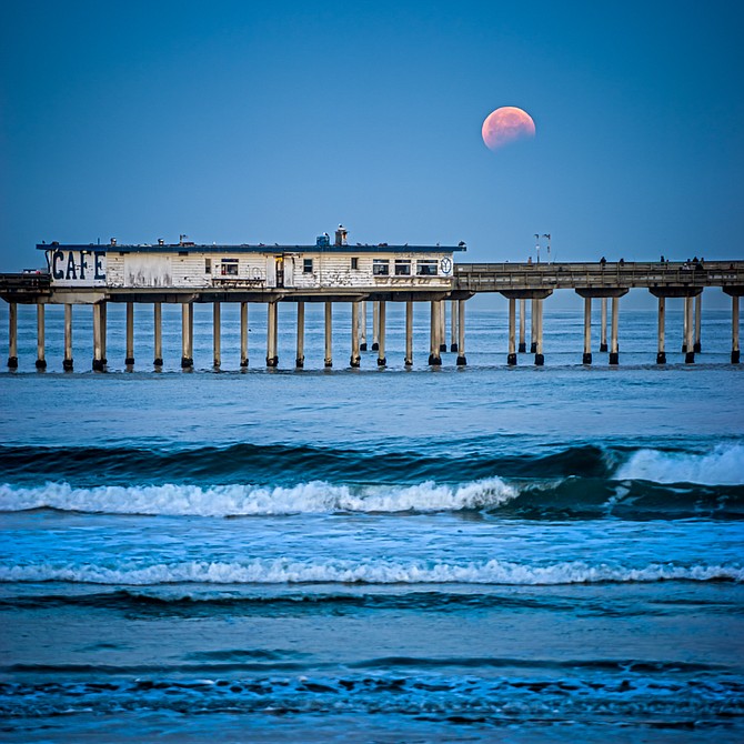 HDR at the end (partial) of the Full Lunar Eclipse (Blood Moon) in Ocean Beach, San Diego.  6:30 am  4▫4▫15  D.Warner