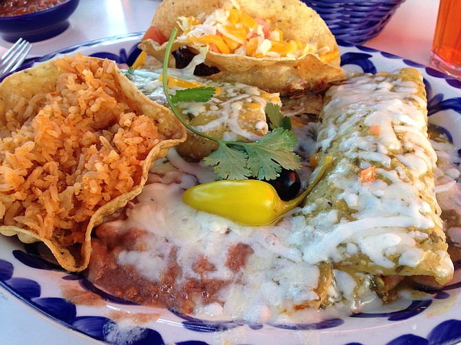 The #2 combinacion: taco, tamale, and enchilada with rice and beans. Everything topped by loads of cheese.