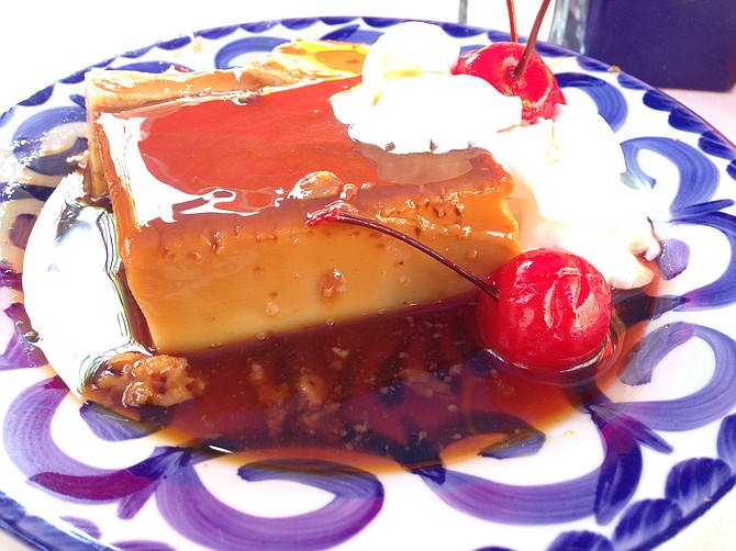 Maraschino cherries give an idea what kind of sweetness awaits in this flan.