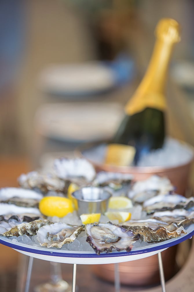 Select oysters go for a buck a shuck during happy hour at Ironside Fish & Oyster