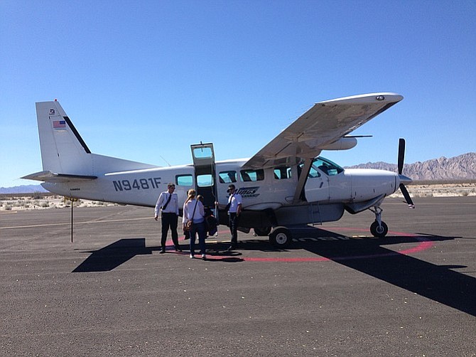 Boarding the 9-passenger SeaPort Airlines plane.
