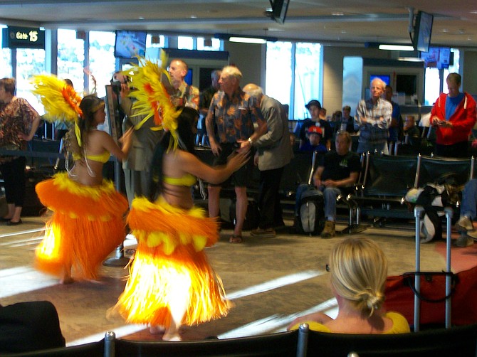 Enjoying hula dance at San Diego Airport's Alaska Airlines gate.