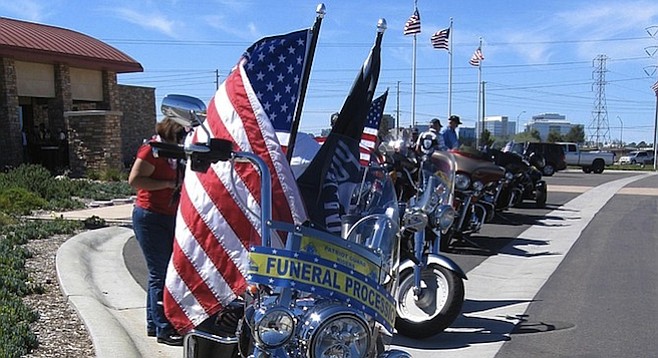 Motorcycles escorted the soldier, his family, and friends to Miramar National Cemetery.