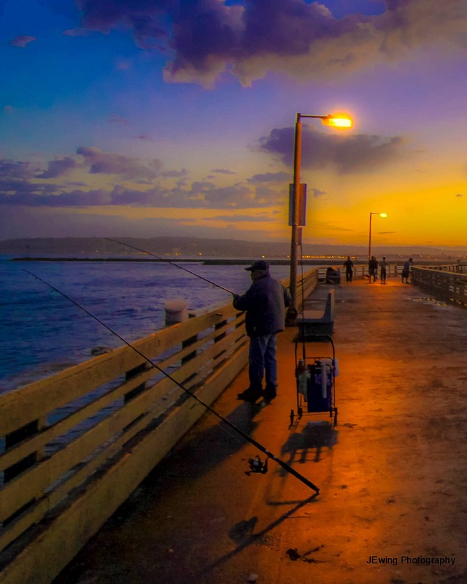 Fisherman on the OB Pier at dawn