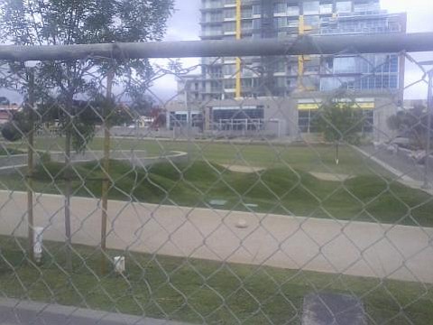 Not only did a bunch of idiots build a colossal tower at 14th and J, completely out of proportion from the rest of the neighborhood and skyline, but now they've sown their new park with a lawn. I suppose they'll make their own water, too. 