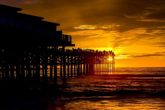 An explosion of dramatic light over Crystal Pier.