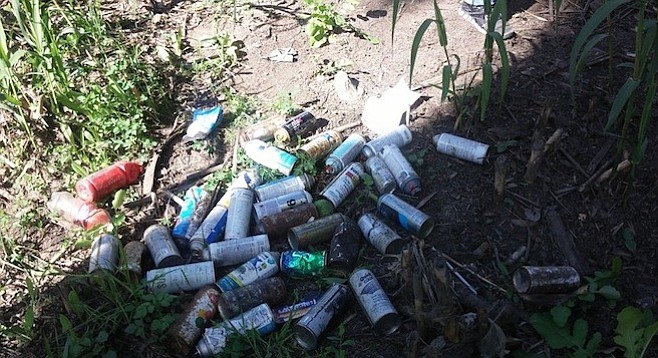 Spray-paint cans littered by graffiti artists at Adobe Falls