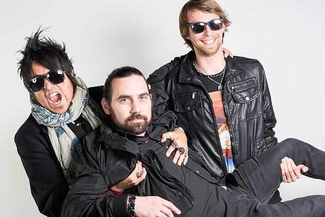 Chris Leyva's "whiskey-laced, lyric-based" alt-rock trio Falling Doves stack 'em at Brick by Brick Friday night.