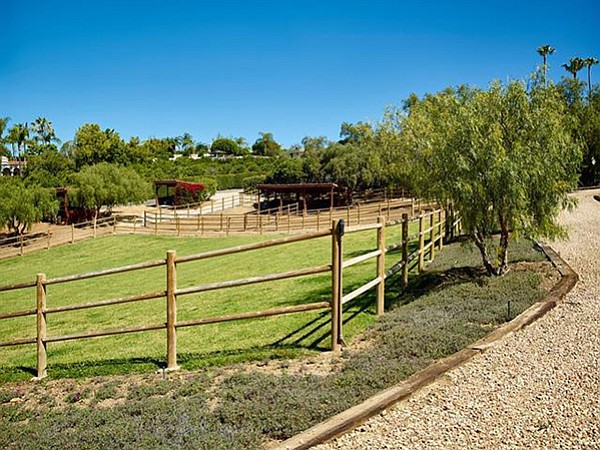 Horse corrals and barn with stables for six horses 