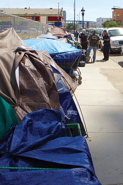 “Before” photo of wall of campers across the street from the new Pinnacle high-rise.