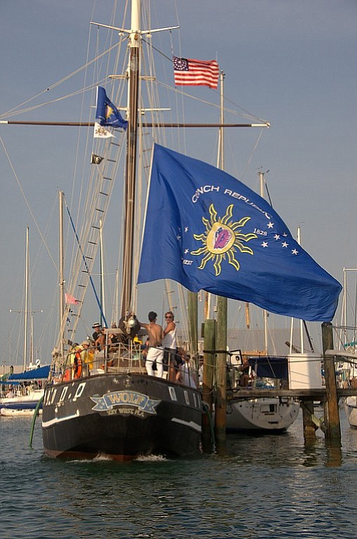 The rebel ship Wolf flies its colors in Key West.