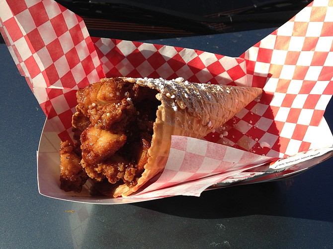 Fried chicken and bacon in a sugar-dusted waffle cone 