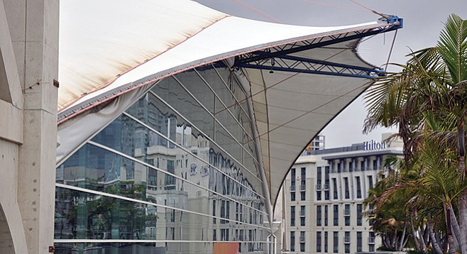 Indications of wear and tear on the convention center’s sails