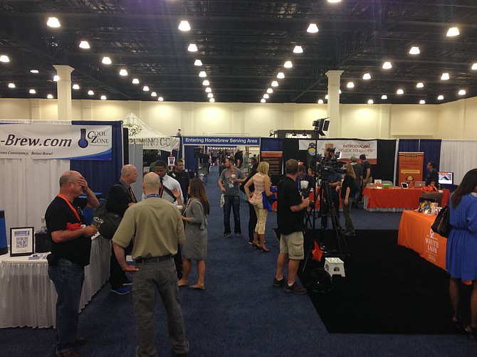 Beer enthusiasts gather on the Nation Homebrewers Convention floor.