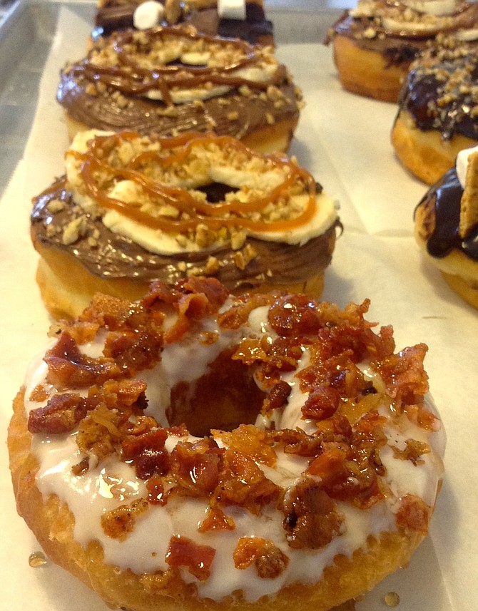 Bacon Donut behind the counter close-up