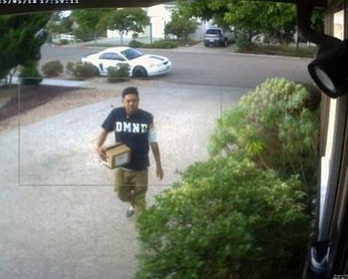 The police released this photo of a suspect that stole a package from a home in the Clairemont area on May 18. He drove off in the white door vehicle shown in the photo. Please call Detective Quintos with any information at 858-552-1735. 