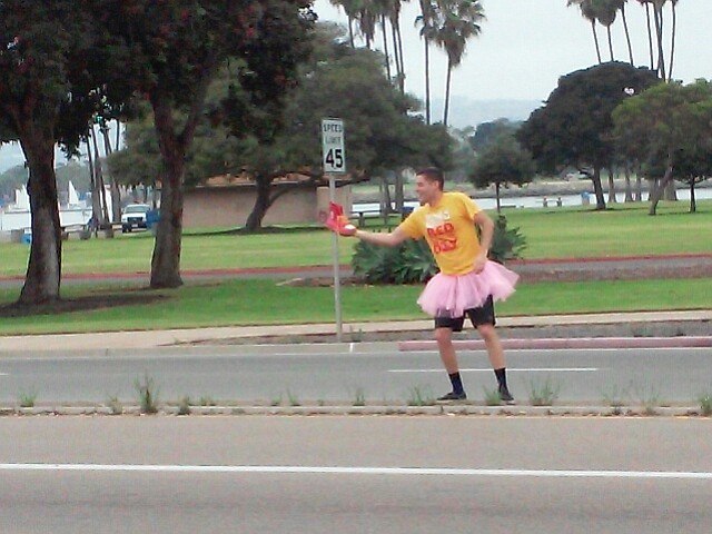 
Tutu For Your Change? Shaking and dancing while rocking a Tutu, Justin Oakland collected donations on the 6th Annual Red Boot Day to benefit Ronald McDonald House Charities of San Diego.