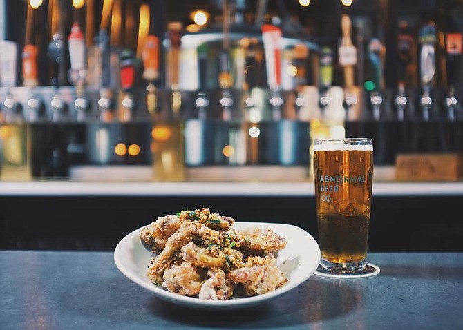Enjoy an Abnormal Beer and a delicious plate of our Salt & Pepper Chicken Wings!