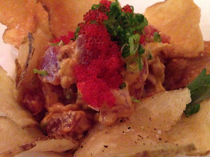Potato chips and flying fish roe contribute to the Spicy Tuna Tartar