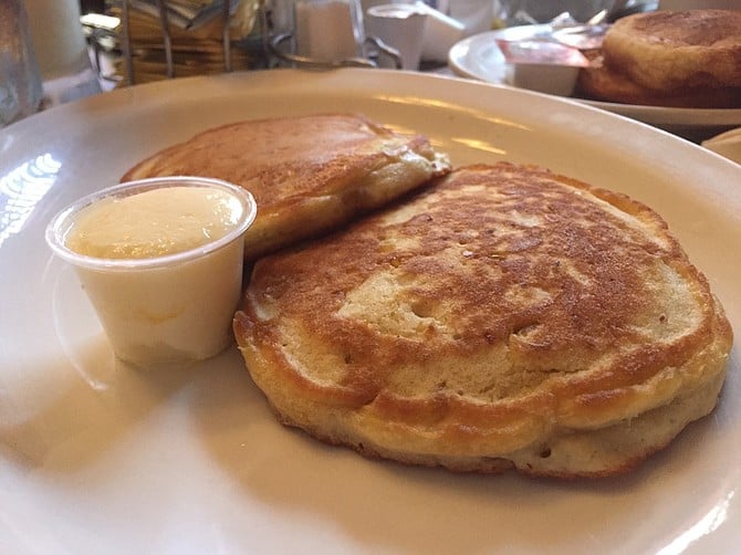 Corn fritters, like corn-biscuit pancakes