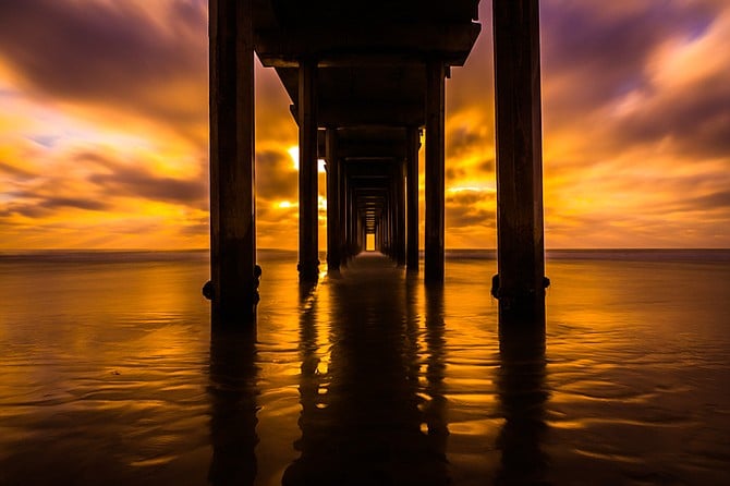 An immensely colorful sunset at Scripps Pier, La Jolla, California